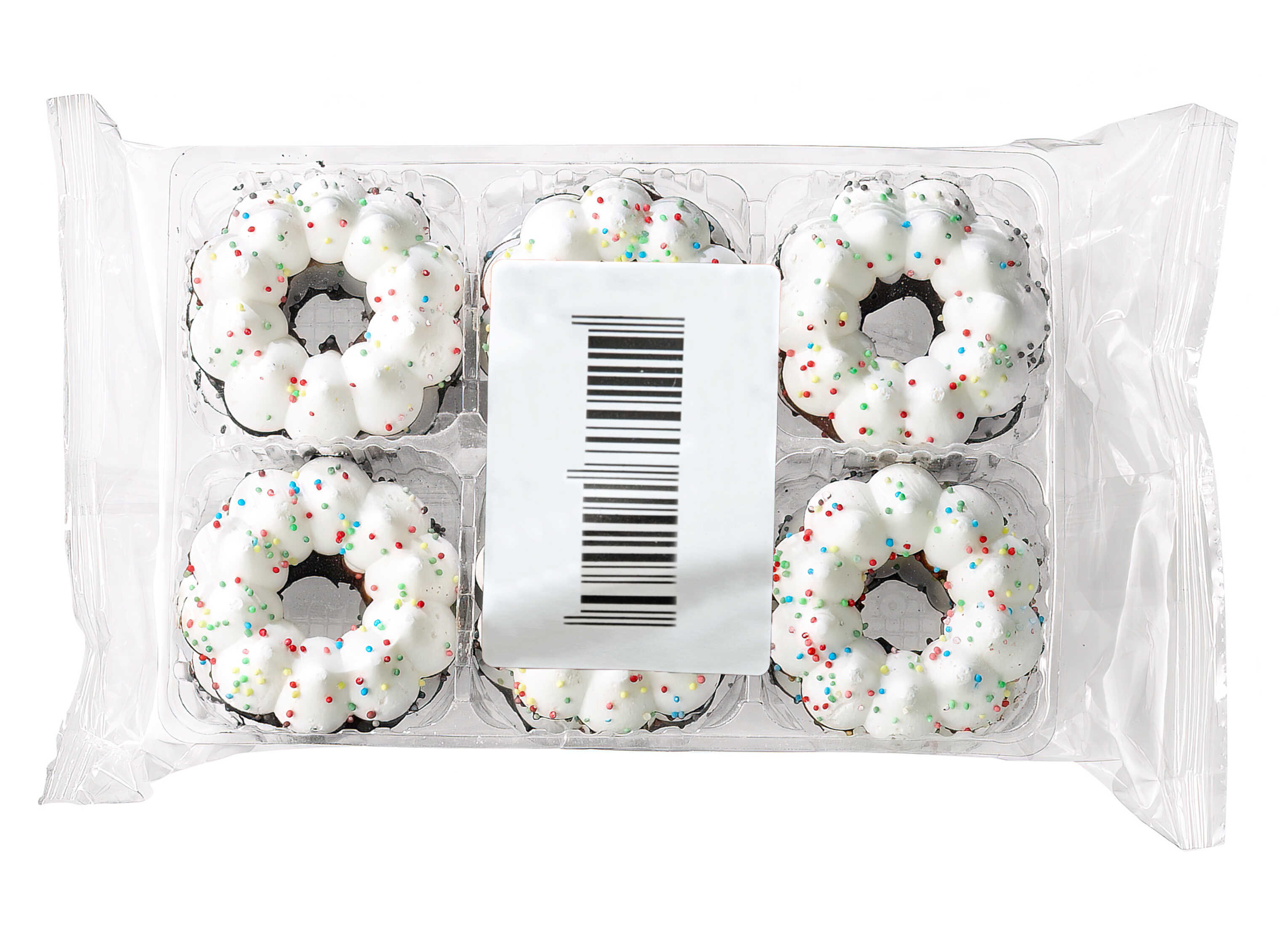 Six petits donuts avec un glaçage blanc et des vermicelles colorés dans un emballage transparent.