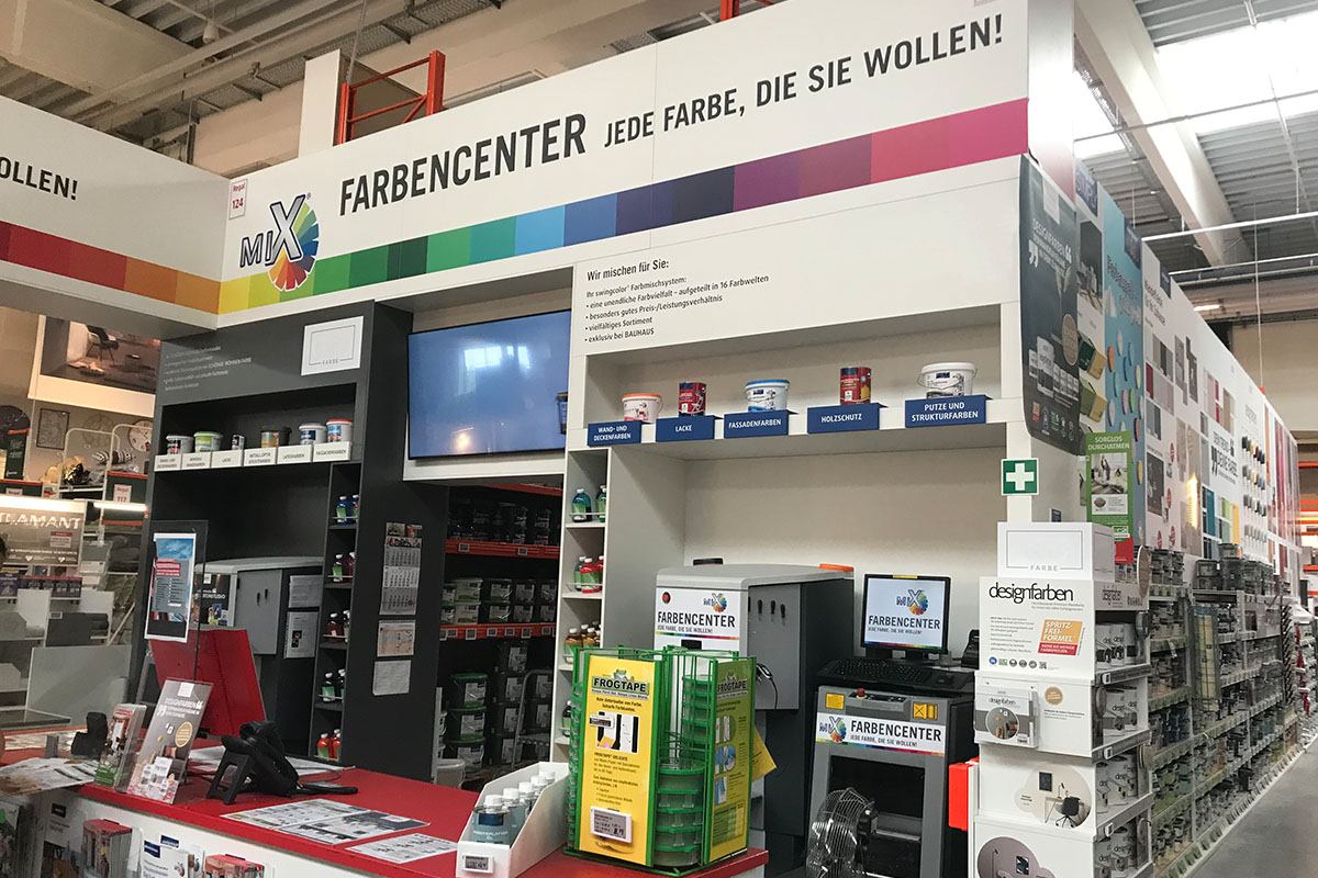 Solutions pour le secteur des matériaux de construction : centre de mélange de couleurs dans le magasin de bricolage