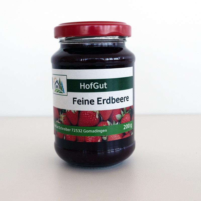 Commander des étiquettes en rouleau en impression numérique en ligne : étiquettes de confiture 'Fraise Fine' sur verre, fond clair.