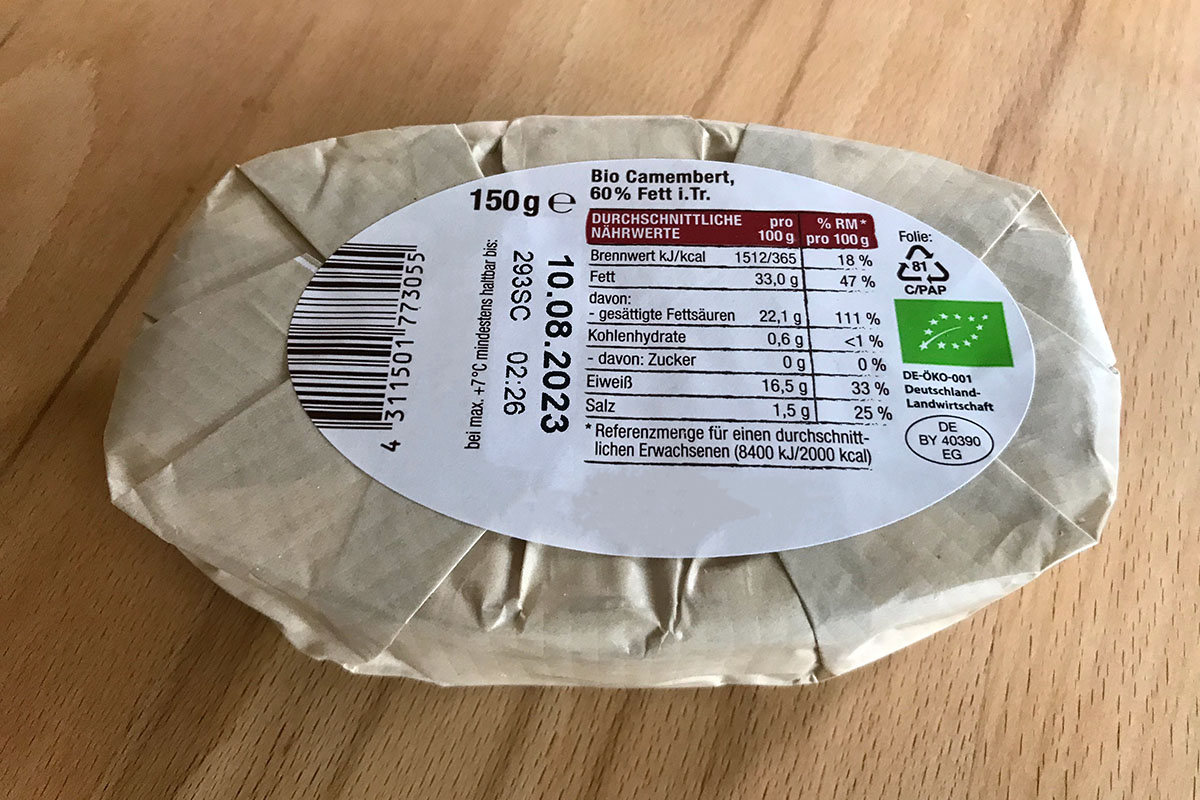 Solutions alimentaires : Étiquette produit et fermeture deux-en-un, préimprimée en couleur, imprimée par transfert thermique avec contenu, MHC, code-barres, sur emballage de fromage.