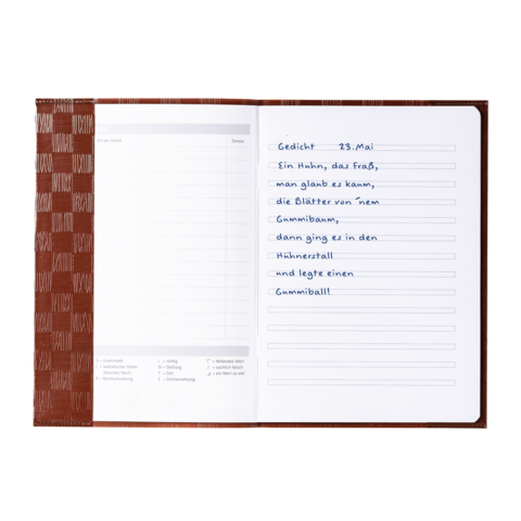 Ein offenes Notizbuch mit handschriftlichem Gedicht, datiert auf den 23. Mai, und leeren Seiten für weitere Einträge.
