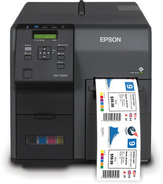 Imprimante d'étiquettes Epson TM-C7500G avec des étiquettes colorées qui sortent du tiroir de sortie. Panneau de commande avec boutons et écran visible.