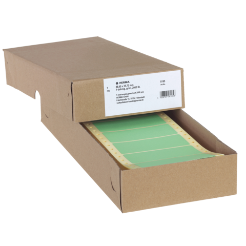 Eine braune Kartonverpackung mit grünem Papier im Inneren, das teilweise herausgezogen ist. Auf der Verpackung befindet sich ein Etikett mit Produktinformationen.