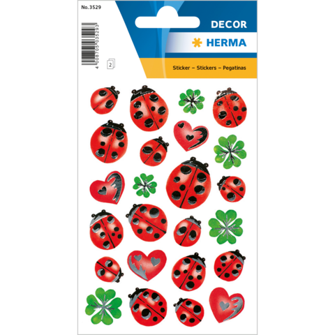 Aufkleberbogen mit verschiedenen Motiven, darunter Marienkäfer, Herzen und Kleeblätter in leuchtenden Farben.