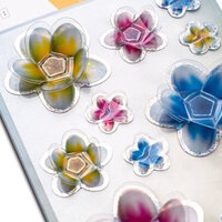 The translation of "Blumen Sticker" from German to French is "Autocollants de fleurs.