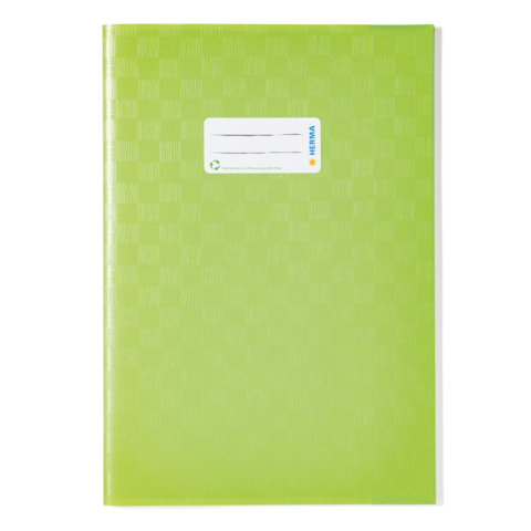 Grünes Notizbuch mit einem weißen Aufkleber für persönliche Angaben auf der Vorderseite.