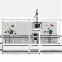 Un dispositif technique avec deux grands ventilateurs, un écran et plusieurs commandes dans un boîtier transparent.