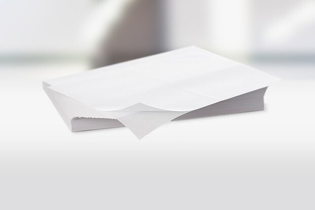 Étiquettes vierges : pile d'étiquettes HERMA, également appelées étiquettes laser, au format paysage.